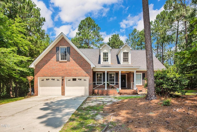 7832 Shuttle Rd, Fayetteville, NC 28311 - view of front of house featuring covered porch, brick siding, driveway, and a shingled roof