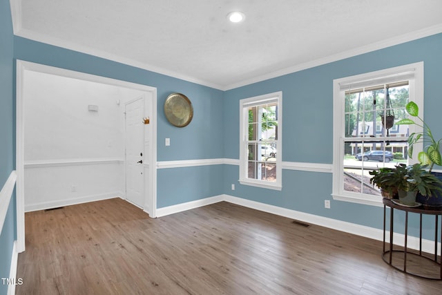 7832 Shuttle Rd, Fayetteville, NC 28311 - entrance foyer featuring crown molding, wood finished floors, and recessed lighting