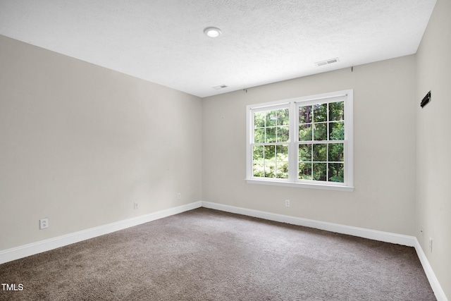 7832 Shuttle Rd, Fayetteville, NC 28311 - carpeted spare room featuring baseboards and a textured ceiling