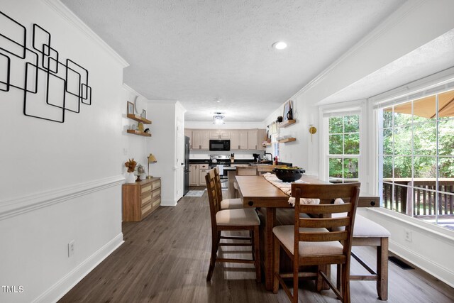 7832 Shuttle Rd, Fayetteville, NC 28311 - dining space featuring a textured ceiling, healthy amount of natural light, dark wood-style flooring, and crown molding