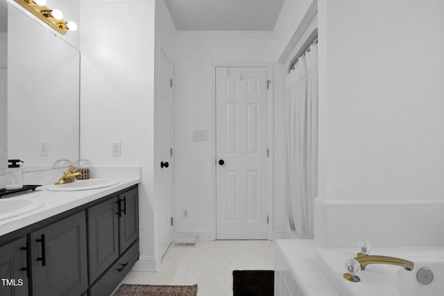 7832 Shuttle Rd, Fayetteville, NC 28311 - bathroom featuring double vanity and tiled tub