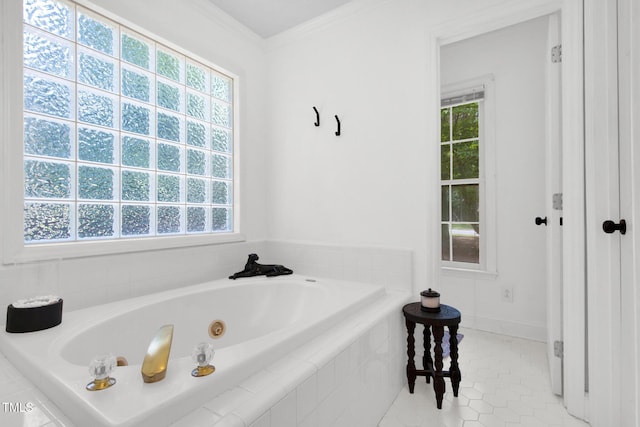 7832 Shuttle Rd, Fayetteville, NC 28311 - full bathroom with healthy amount of natural light, a whirlpool tub, tile patterned flooring, and ornamental molding