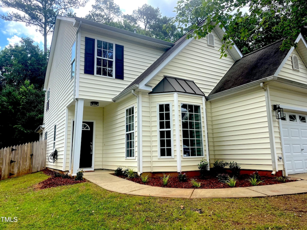 2409 Valley Haven Dr, Raleigh, NC 27603 - view of front of home with an attached garage
