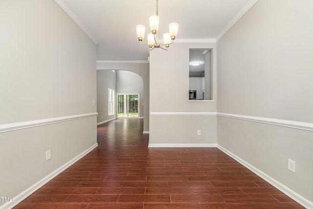 2409 Valley Haven Dr, Raleigh, NC 27603 - unfurnished dining area featuring arched walkways, a chandelier, ornamental molding, and dark wood finished floors