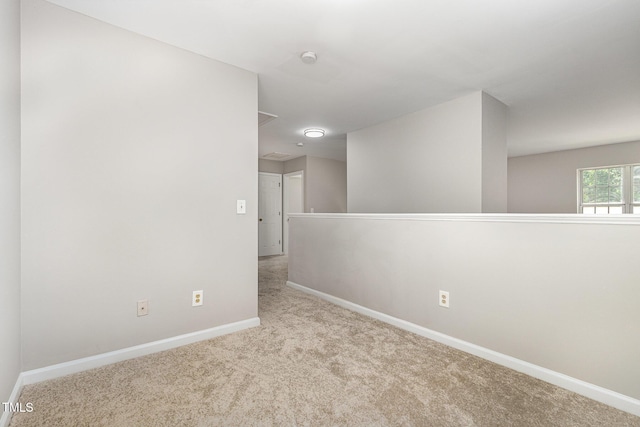 2409 Valley Haven Dr, Raleigh, NC 27603 - spare room with carpet and a smoke detector