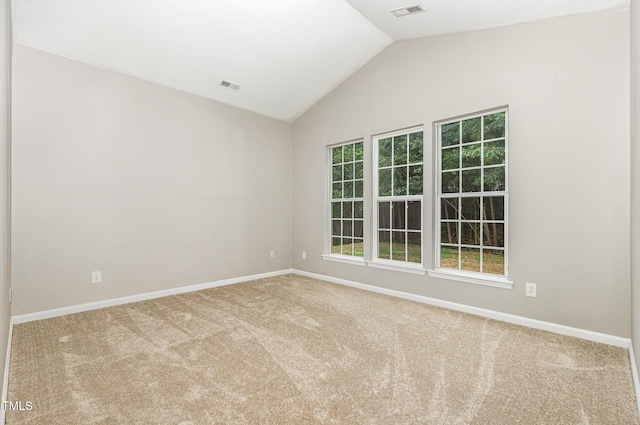 2409 Valley Haven Dr, Raleigh, NC 27603 - empty room featuring carpet floors and vaulted ceiling