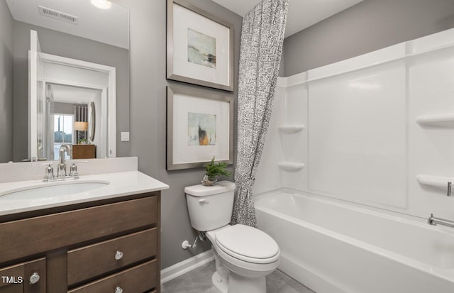 4028 Kidd Pl, Durham, NC 27703 - bathroom with vanity, toilet, shower / bathtub combination with curtain, and baseboards