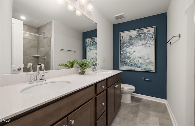4028 Kidd Pl, Durham, NC 27703 - full bath featuring double vanity, tiled shower, baseboards, and toilet