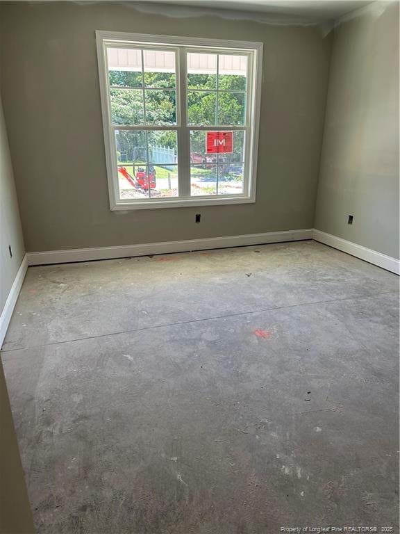 6207 Glenlea Cir, Fayetteville, NC 28314 - spare room featuring plenty of natural light and concrete floors