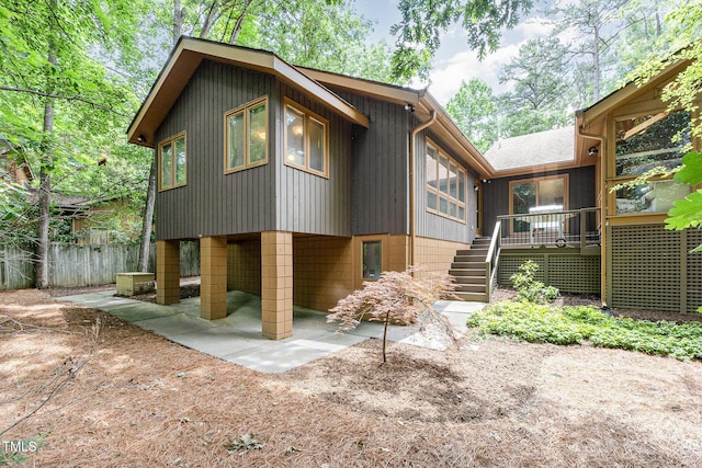 6 Womble Cir, Durham, NC 27705 - rear view of property featuring stairs, a deck, and a patio area