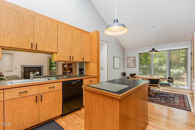 6 Womble Cir, Durham, NC 27705 - kitchen featuring black dishwasher, vaulted ceiling, light wood finished floors, pendant lighting, and a center island