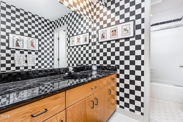 6 Womble Cir, Durham, NC 27705 - full bath with vanity, tile walls, and tub / shower combination