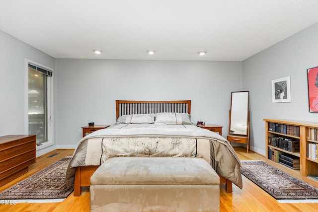 6 Womble Cir, Durham, NC 27705 - bedroom with wood finished floors and baseboards