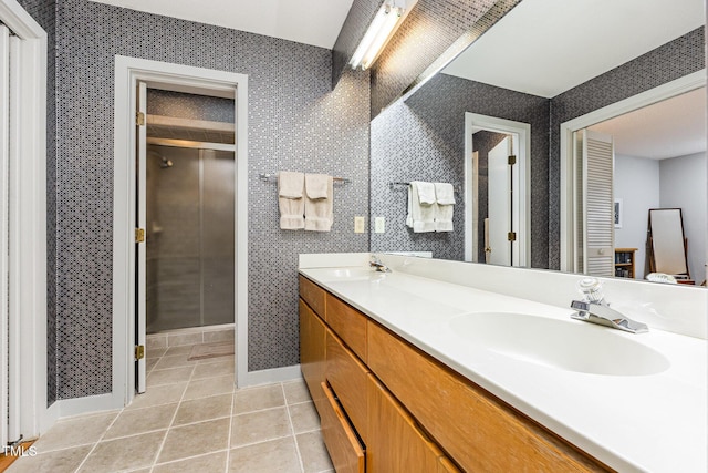 6 Womble Cir, Durham, NC 27705 - full bathroom with double vanity, tile patterned floors, and a shower stall