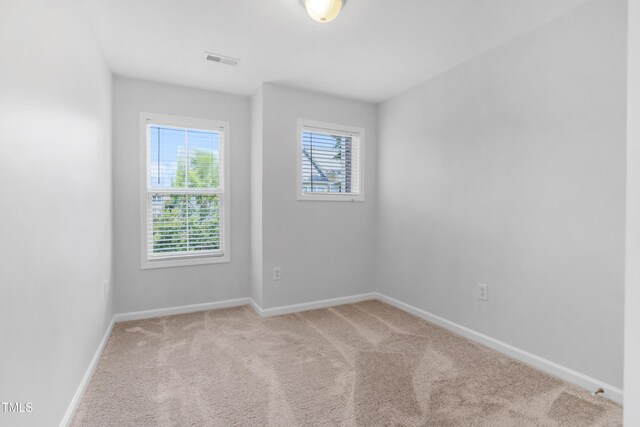 412 Heritage Village Ln, Apex, NC 27502 - unfurnished room featuring light colored carpet and baseboards