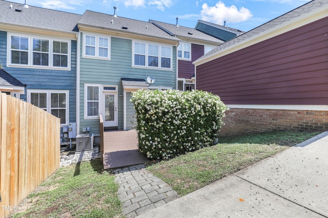 412 Heritage Village Ln, Apex, NC 27502 - back of house featuring a wooden deck and central AC