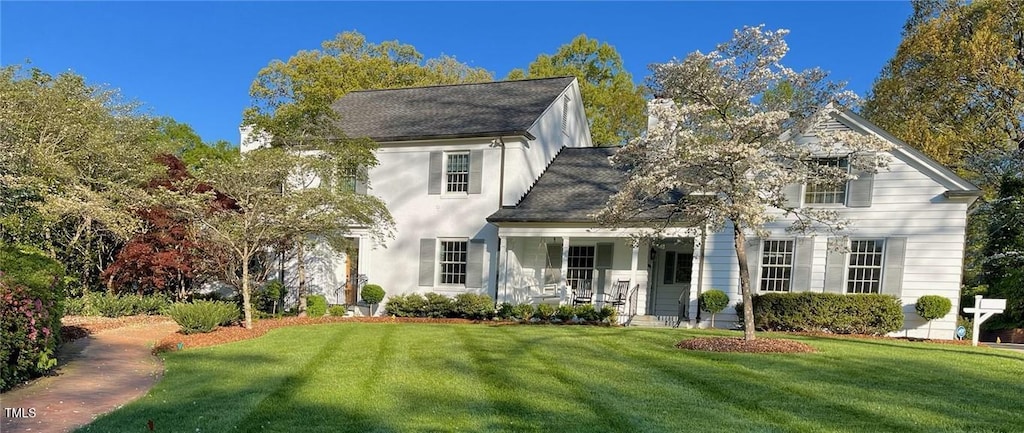 1004 E Willowbrook Dr, Burlington, NC 27215 - view of front of property featuring a front yard and covered porch