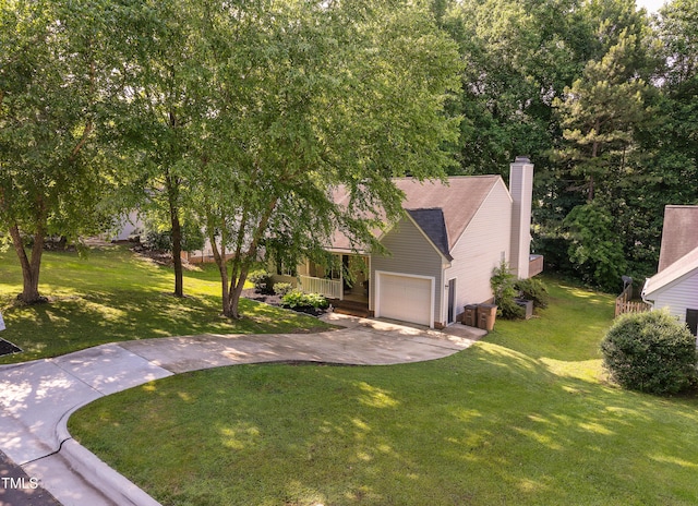 358 Tillamook Dr, Wake Forest, NC 27587 - view of front facade with driveway, a front yard, a garage, and a chimney
