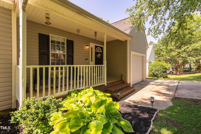 358 Tillamook Dr, Wake Forest, NC 27587 - entrance to property with a porch, driveway, and an attached garage