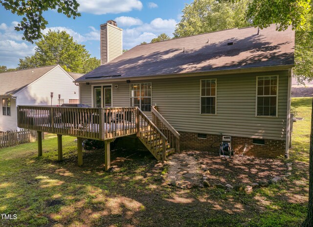 358 Tillamook Dr, Wake Forest, NC 27587 - rear view of house featuring crawl space, a wooden deck, and a chimney