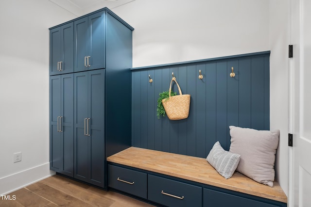 217 Dublin Rd, Raleigh, NC 27609 - mudroom with wood finished floors and a wainscoted wall