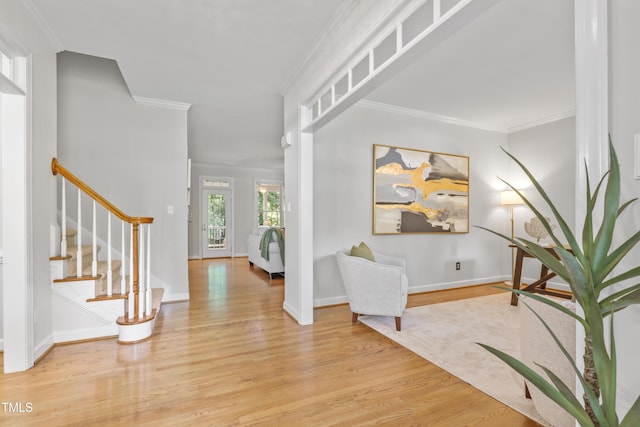 314 Chanticlair Dr, Apex, NC 27502 - entryway with wood finished floors, stairway, crown molding, and baseboards
