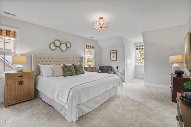 314 Chanticlair Dr, Apex, NC 27502 - bedroom featuring light colored carpet, baseboards, a chandelier, and vaulted ceiling