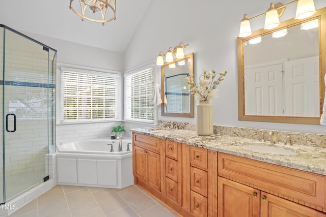 314 Chanticlair Dr, Apex, NC 27502 - full bath featuring lofted ceiling, double vanity, a bath, a stall shower, and tile patterned flooring