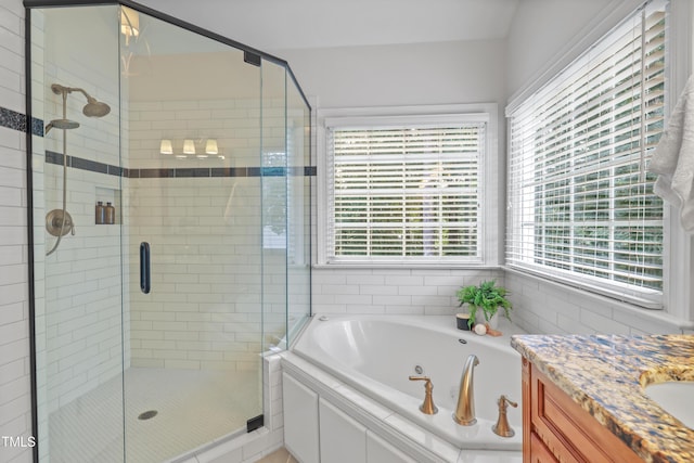 314 Chanticlair Dr, Apex, NC 27502 - full bath with a tub with jets, a stall shower, and vanity