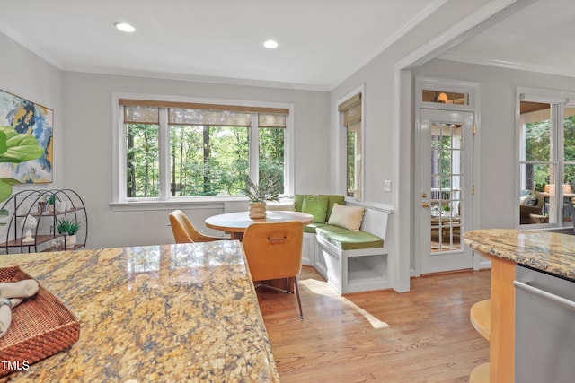 314 Chanticlair Dr, Apex, NC 27502 - dining area with plenty of natural light, ornamental molding, light wood finished floors, and recessed lighting
