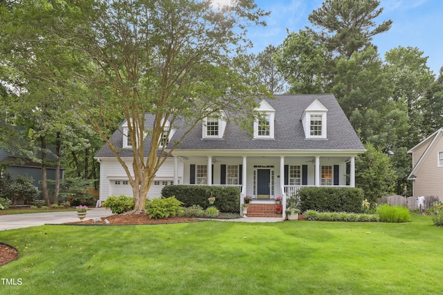 314 Chanticlair Dr, Apex, NC 27502 - new england style home featuring covered porch, a shingled roof, a garage, and concrete driveway