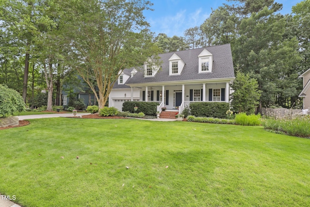 314 Chanticlair Dr, Apex, NC 27502 - cape cod-style house featuring a porch, a front yard, and driveway