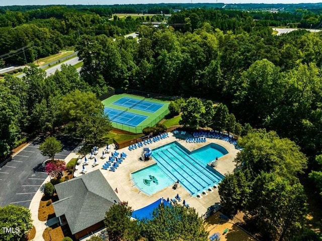 314 Chanticlair Dr, Apex, NC 27502 - bird's eye view of a pool and a forest