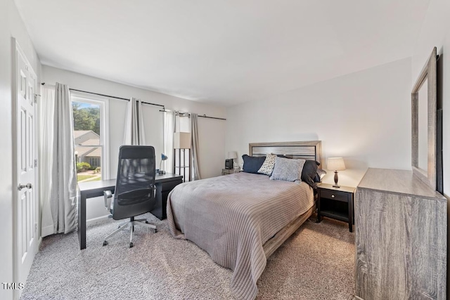 72 Justin Ct, Durham, NC 27705 - carpeted bedroom featuring an office area and baseboards