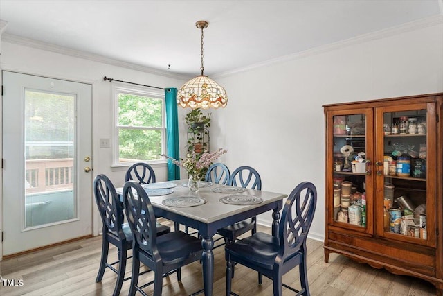 105 Otter Dr, Cary, NC 27513 - dining area featuring light wood-style flooring and ornamental molding
