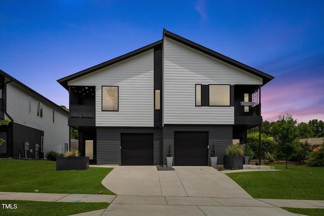 2225 Millbank Village Ct Unit 101, Raleigh, NC 27610 - modern home with a front yard, a balcony, and driveway