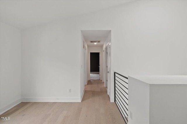 2225 Millbank Village Ct Unit 101, Raleigh, NC 27610 - hall featuring light wood-style flooring and baseboards