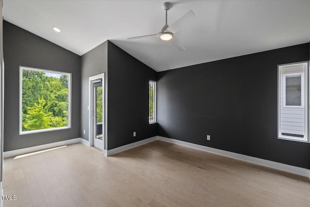 2225 Millbank Village Ct Unit 101, Raleigh, NC 27610 - unfurnished room with vaulted ceiling, wood finished floors, a ceiling fan, baseboards, and recessed lighting