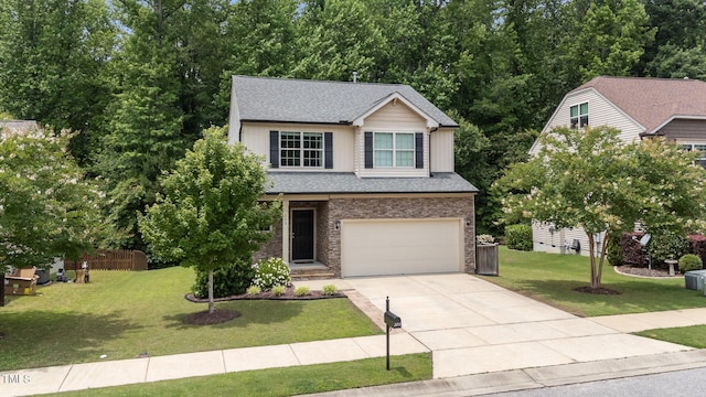 205 Willow Weald Ct, Fuquay Varina, NC 27526 - view of front of home with driveway, a garage, a front lawn, roof with shingles, and brick siding