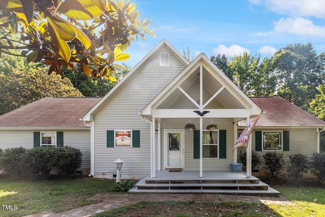 3298 Oakridge Dr Unit A, Graham, NC 27253 - view of front of house featuring covered porch, crawl space, and roof with shingles