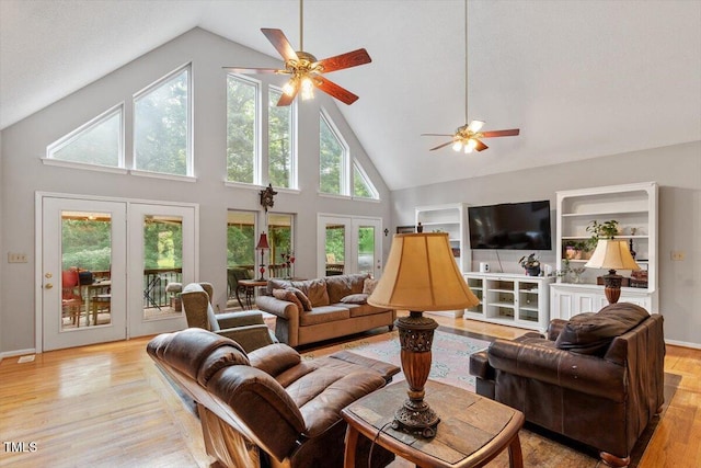 3298 Oakridge Dr Unit A, Graham, NC 27253 - living room with a ceiling fan, high vaulted ceiling, and light wood-type flooring
