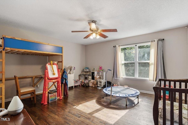 3298 Oakridge Dr Unit A, Graham, NC 27253 - bedroom with wood finished floors, a textured ceiling, and ceiling fan