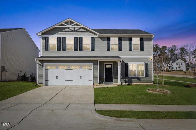 1004 Bridgewater Dr, Durham, NC 27704 - view of front of property with concrete driveway, a front yard, and an attached garage