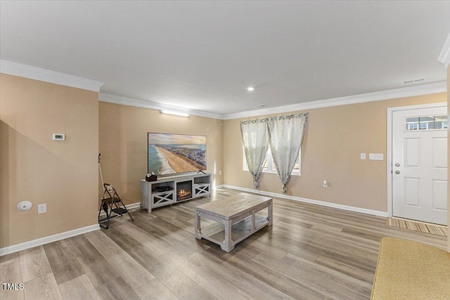 1004 Bridgewater Dr, Durham, NC 27704 - living area with crown molding, baseboards, light wood-style floors, and recessed lighting