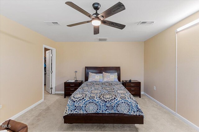 1004 Bridgewater Dr, Durham, NC 27704 - bedroom with light colored carpet, baseboards, and a ceiling fan