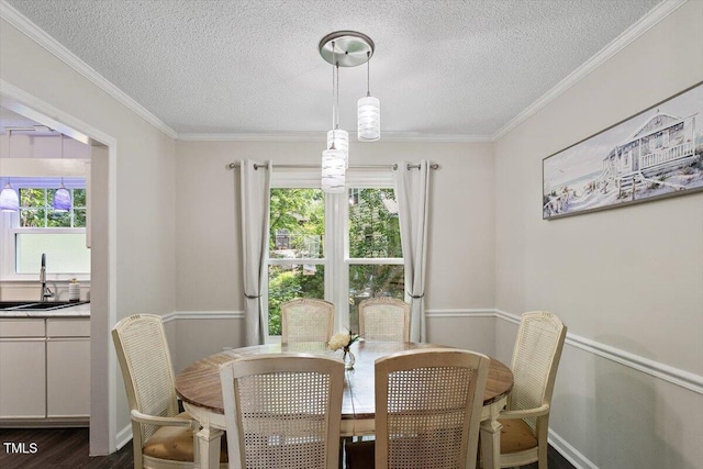 1 Old Towne Pl, Durham, NC 27713 - dining room with a textured ceiling, ornamental molding, and dark wood finished floors
