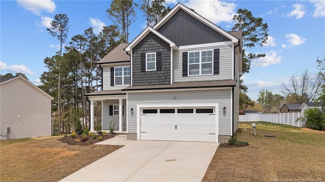60 Bennett Rd, Coats, NC 27521 - view of front of property with a garage and concrete driveway