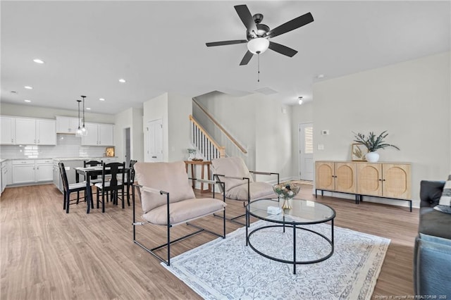60 Bennett Rd, Coats, NC 27521 - living room featuring stairway, light wood finished floors, ceiling fan, and recessed lighting