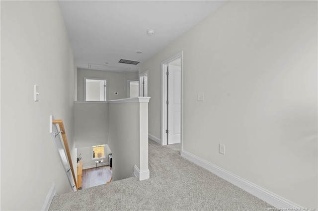 60 Bennett Rd, Coats, NC 27521 - hall featuring an upstairs landing, carpet, baseboards, and attic access