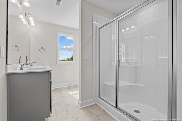 60 Bennett Rd, Coats, NC 27521 - full bathroom featuring a stall shower, marble finish floors, vanity, and baseboards